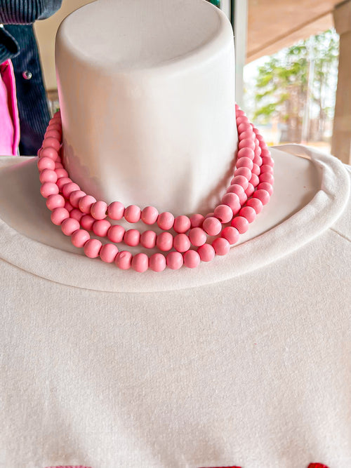 1CNC X388-Triple Strand Pink Wood Bead Necklace